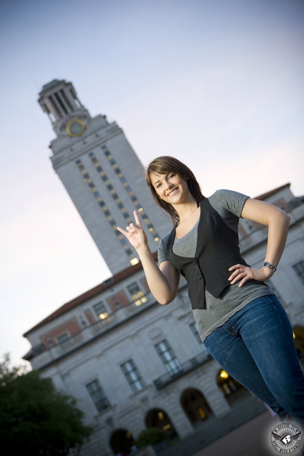 University of Texas at Austin college graduation pictures taken on the UT campus in front of the UT Tower.